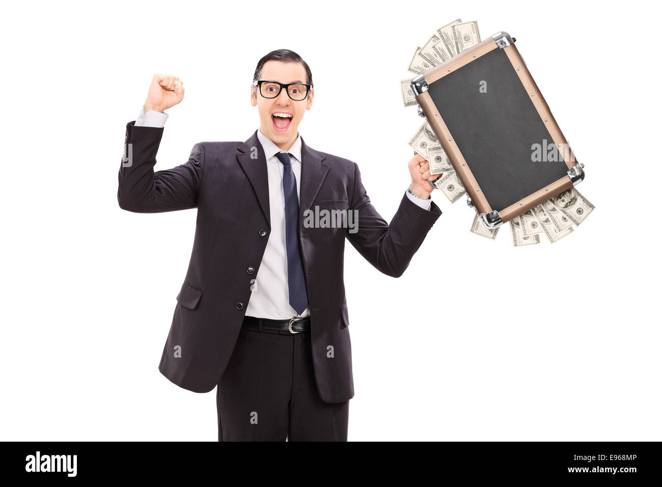 Imprenditore entusiasta tenendo un sacchetto pieno di denaro isolato su sfondo bianco Foto Stock