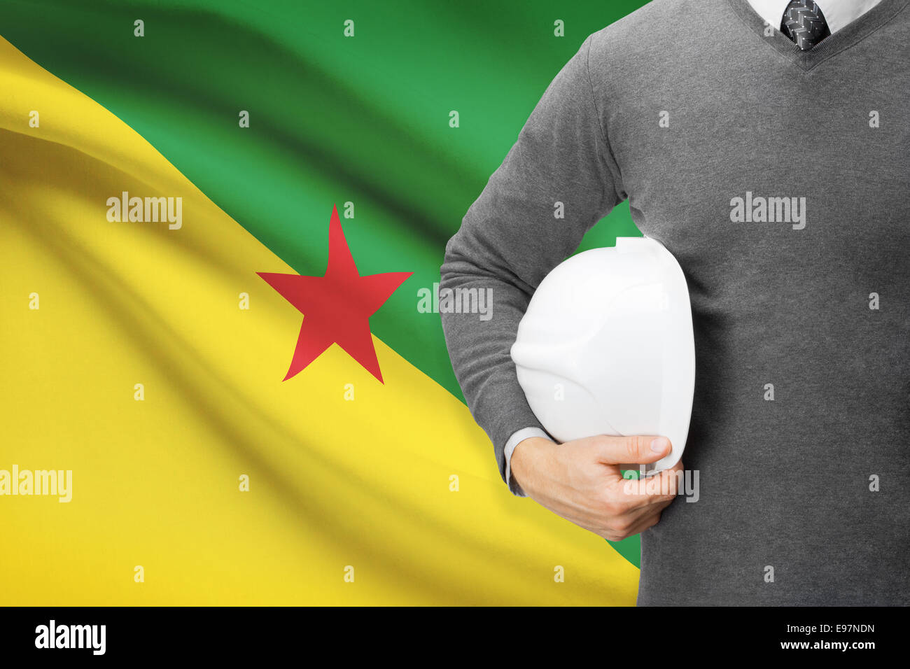 Ingegnere con bandiera su sfondo - Guyana francese Foto Stock