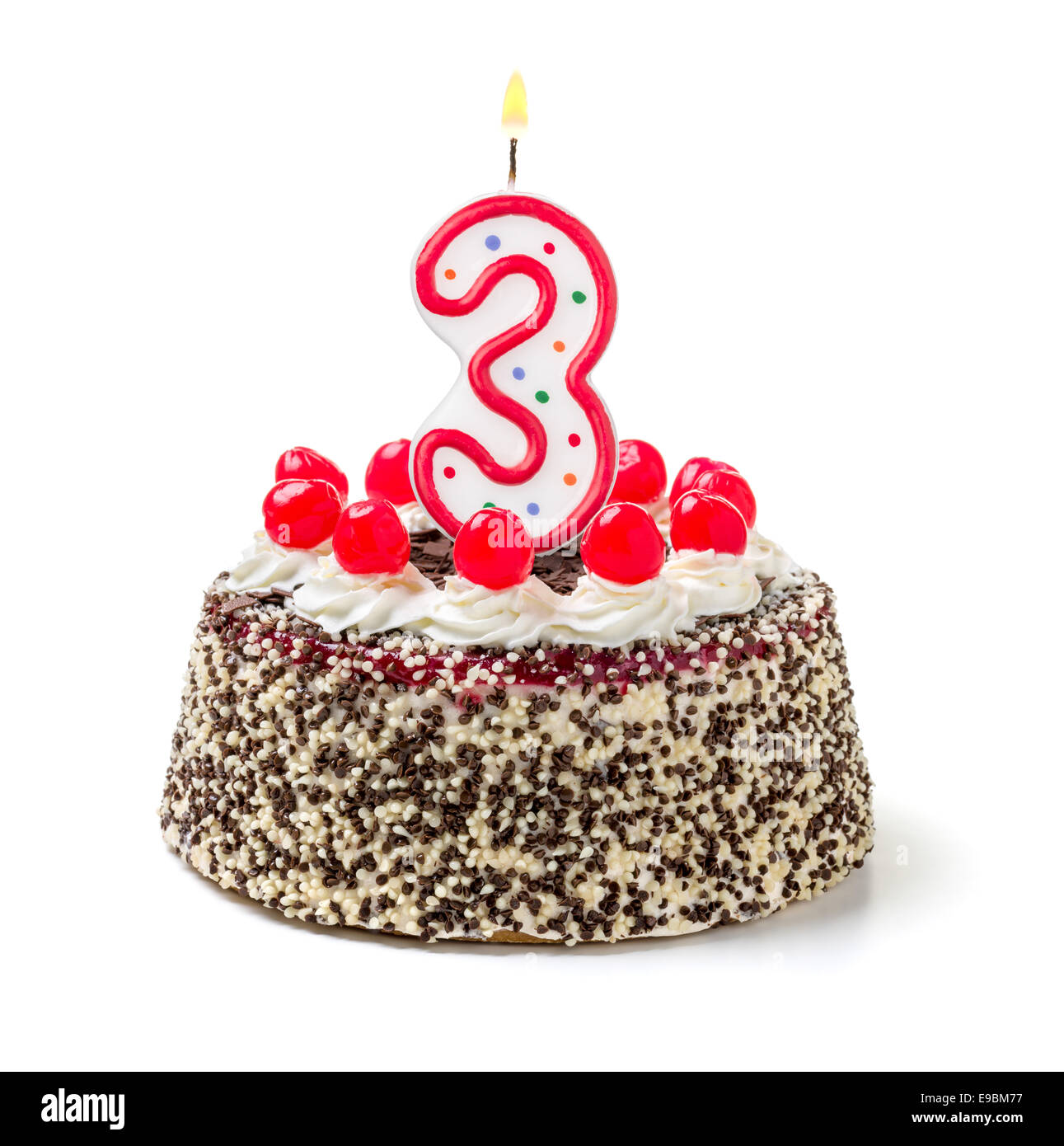 Torta di compleanno con candela che brucia il numero 3 Foto Stock
