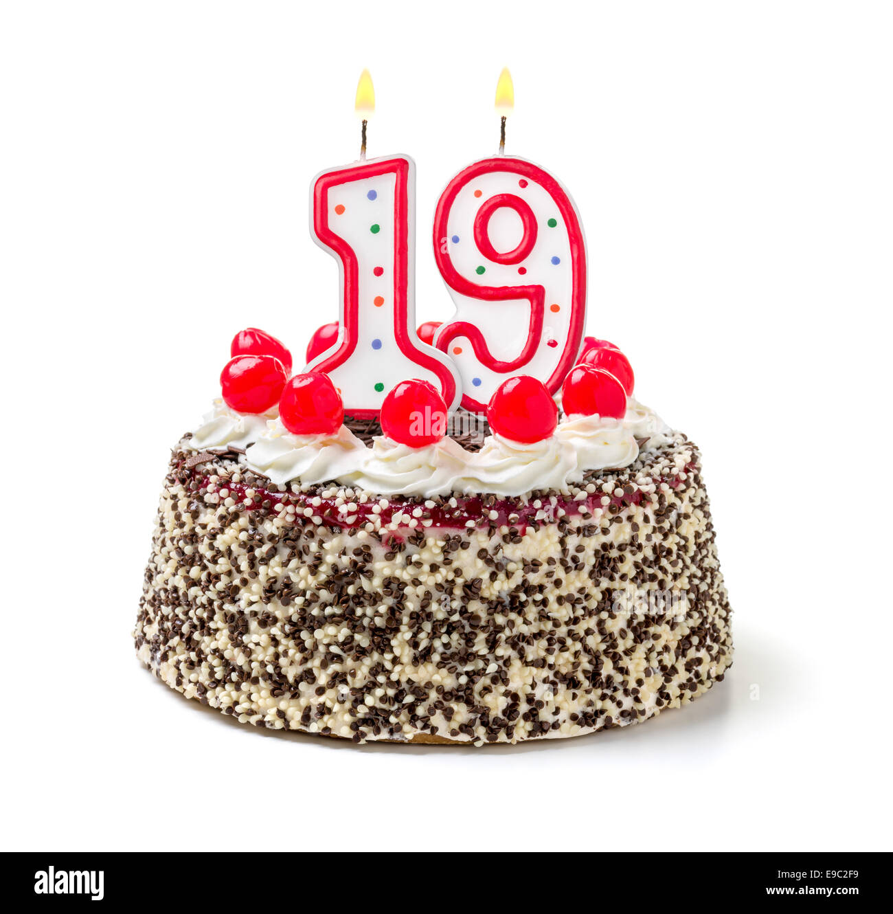 Torta di compleanno con candela che brucia il numero 19 Foto Stock