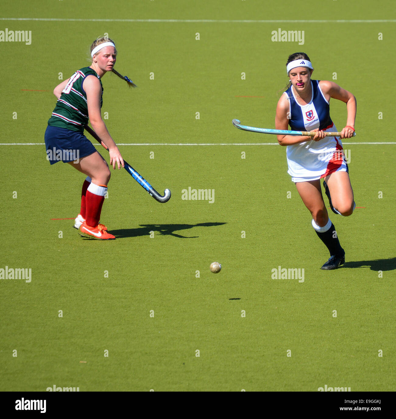 Scuola di hockey ragazza Foto Stock