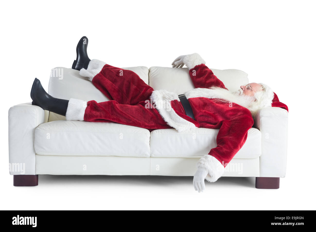 Babbo Natale dorme su un lettino Foto Stock