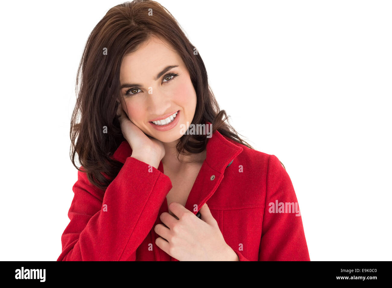 Ritratto di un felice bruna nel rivestimento di colore rosso Foto Stock