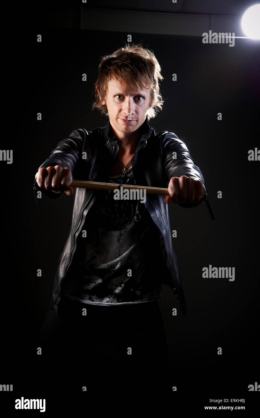 Il batterista, Dom Howard dei Muse Foto Stock