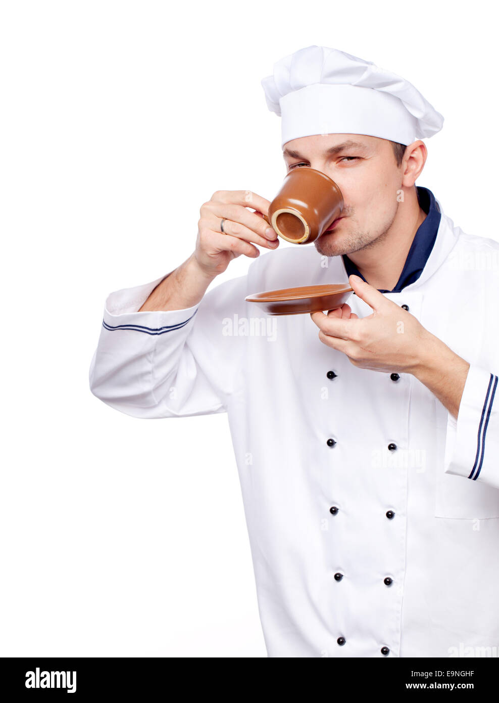 Chef in uniforme e la coppa Foto Stock