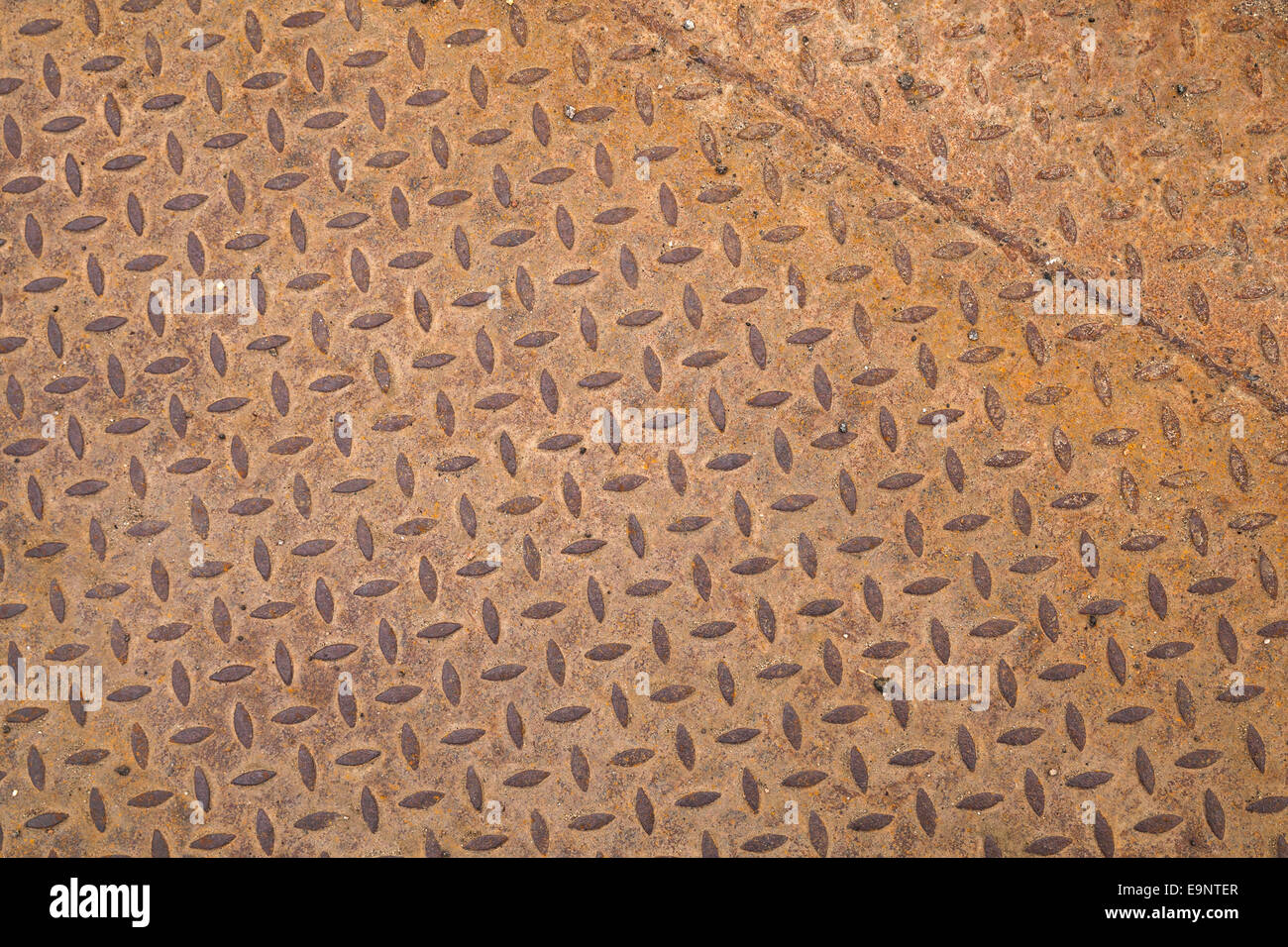 Arrugginita lamiera di acciaio con struttura a diamante, texture di sfondo Foto Stock