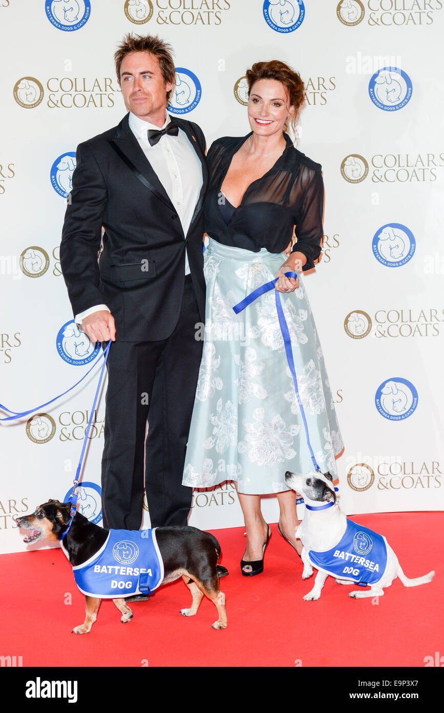 Londra, Regno Unito. Il 30 ottobre, 2014. Sarah parrocchia; James Murray assiste il 'collari & Cappotti Gala Ball' in onore di WW1 cani di servizio a Battersea Evolution a Londra. Credito: Vedere Li/Alamy Live News Foto Stock