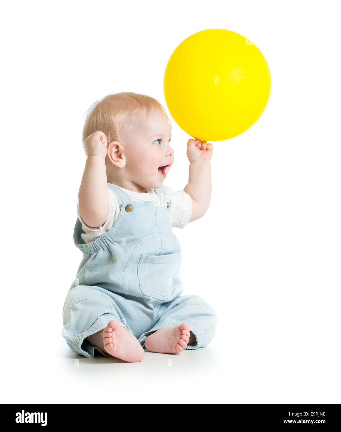 Allegro bambino con palloncino in mano Foto Stock