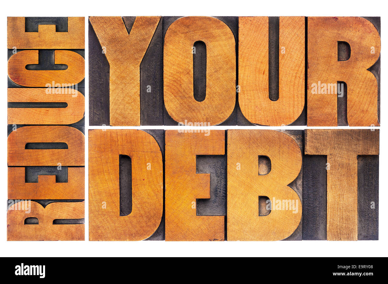 Ridurre il debito finanziario - Nozione - testo isolato in rilievografia vintage tipo legno Foto Stock