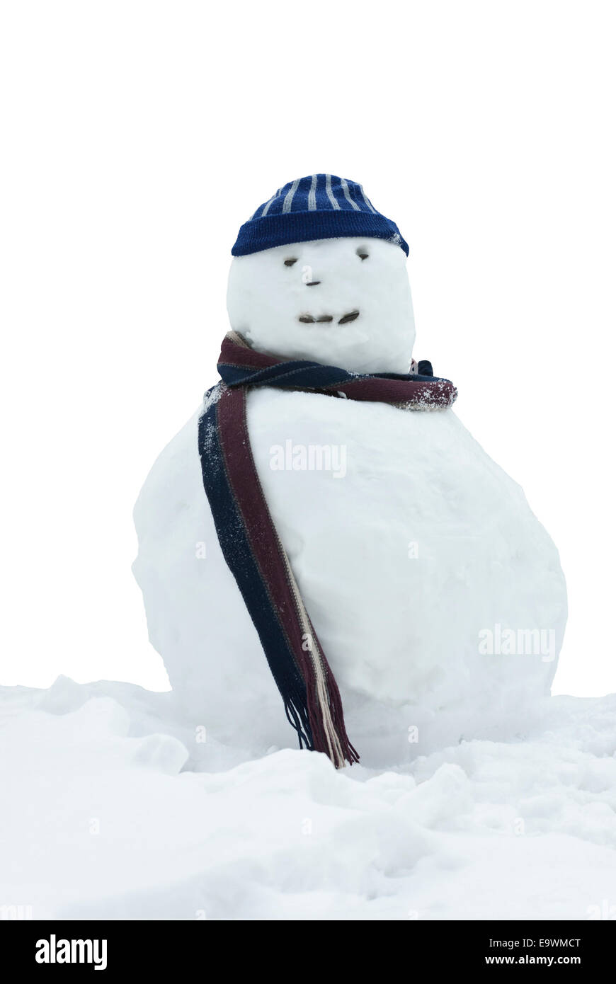 Felice pupazzo di neve con wooly hat e sciarpa. Foto Stock