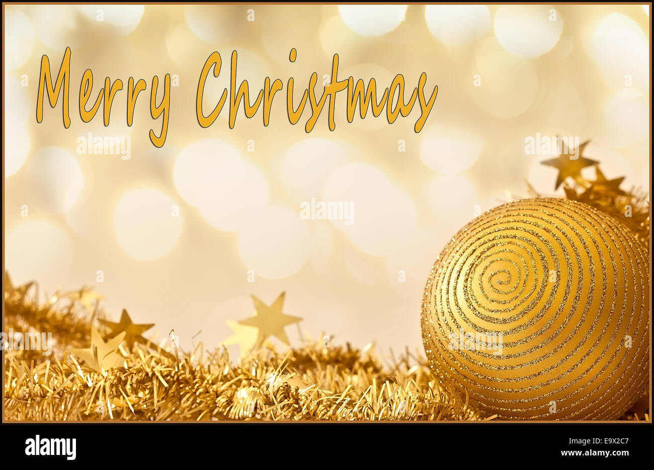 Buon Natale con carta oro, glitter e testo Foto Stock