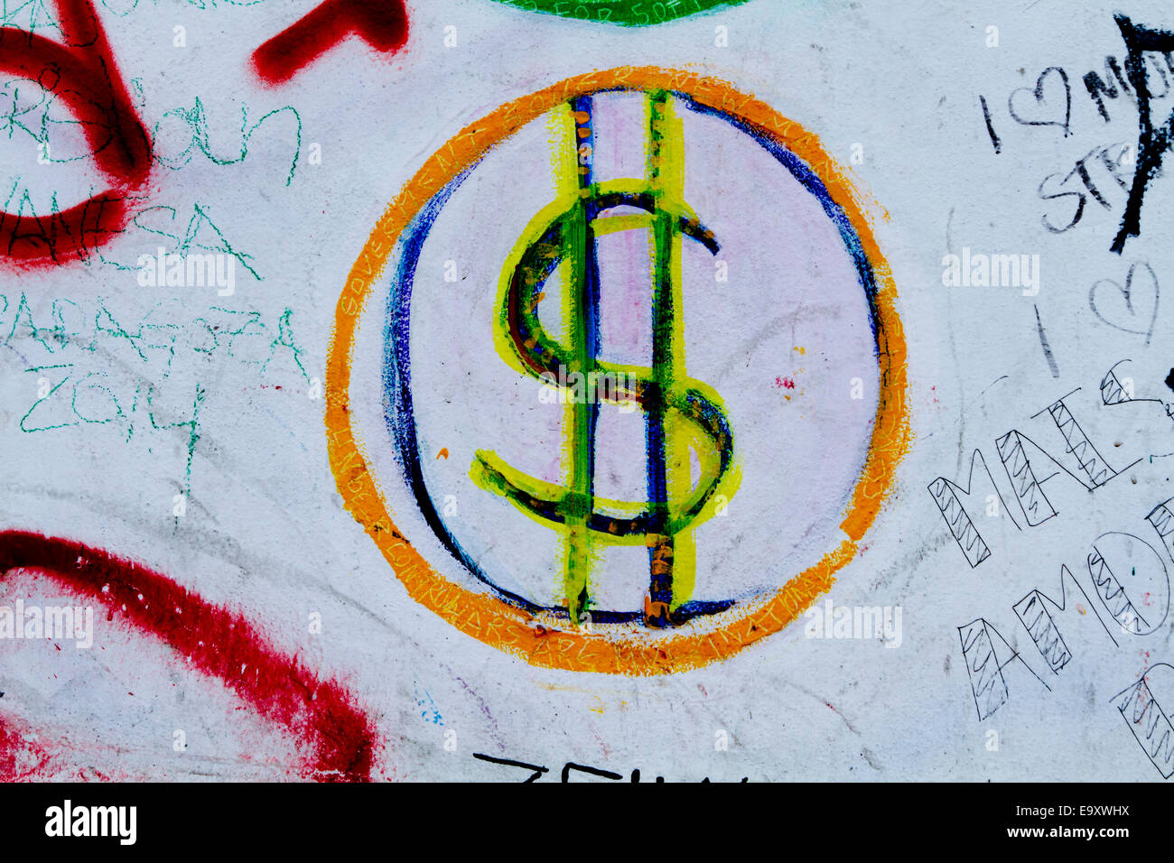 Muro di Berlino cartoon Graffiti colorato dollar sign Foto Stock