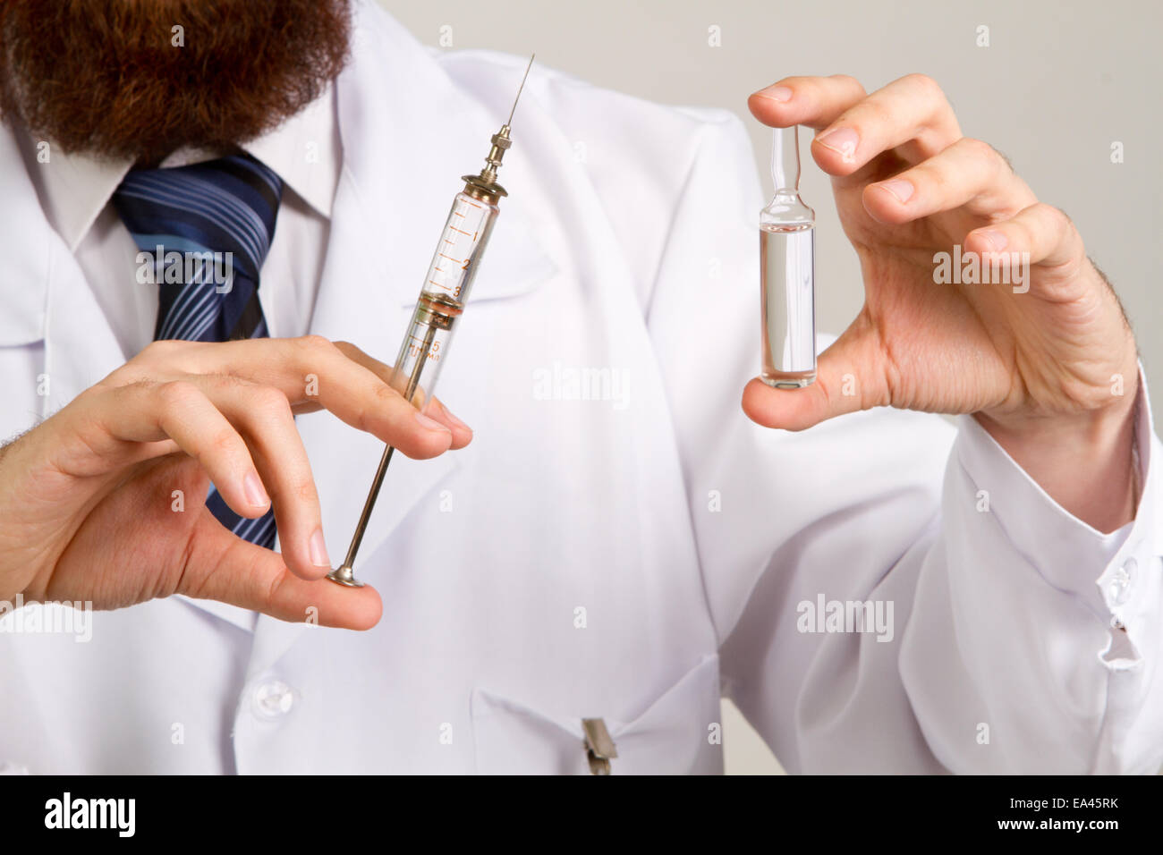 Vecchia siringa di vetro Foto Stock