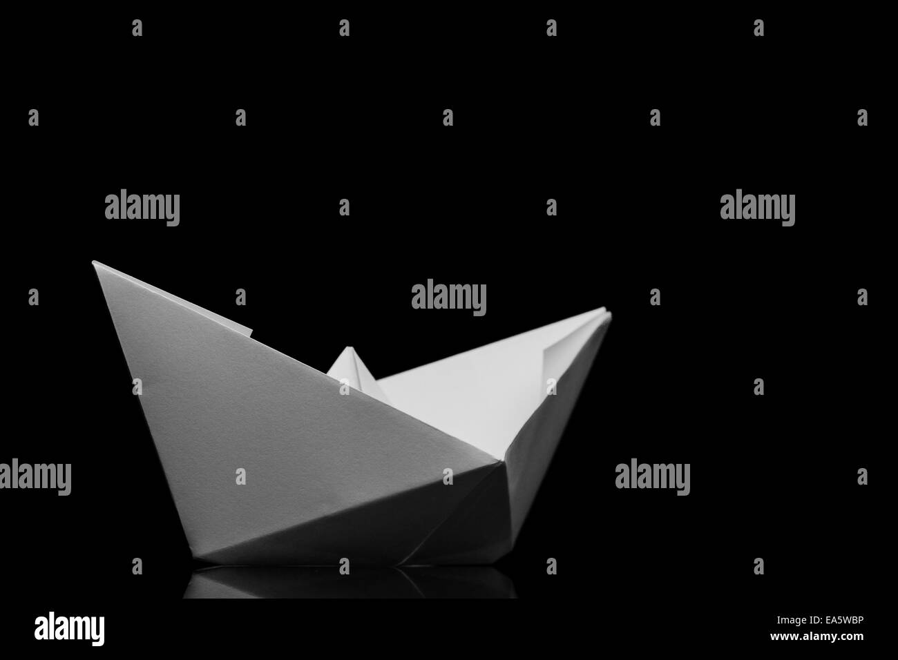Carta origami nave Foto Stock