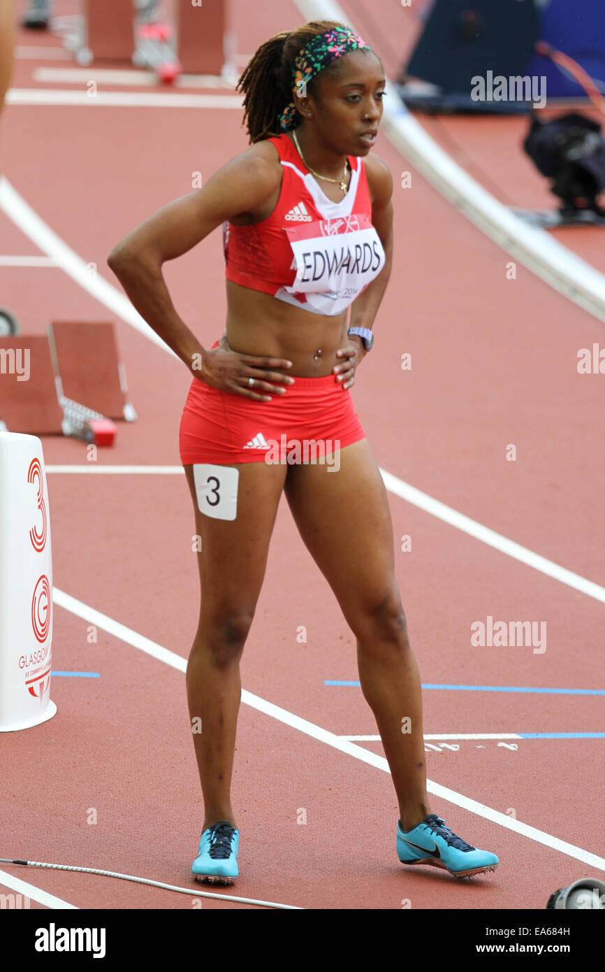 Samantha Edwards di Antigua in atletica in womens 400 metri riscalda a Hampden Park, nel 2014 giochi del Commonwealth Foto Stock