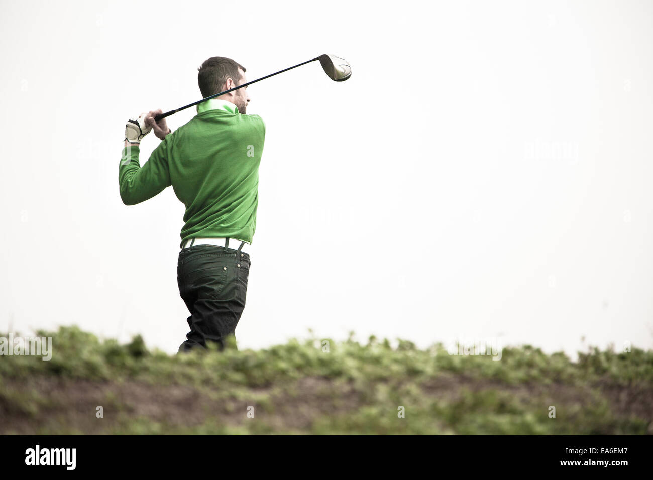 Uomo che gioca a golf, Irlanda Foto Stock