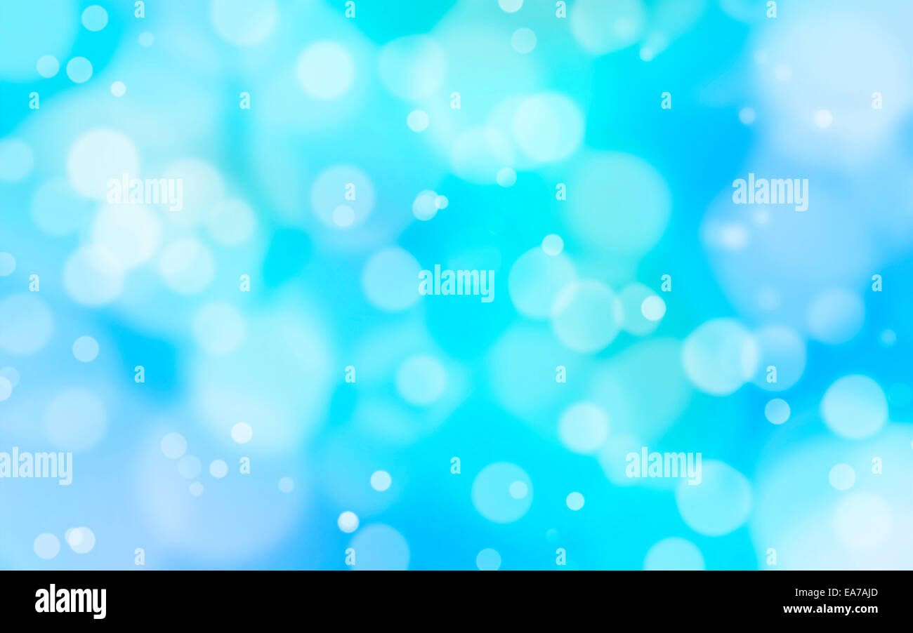 Un blu e bianco sfondo bokeh di fondo con razzi bianco Foto Stock