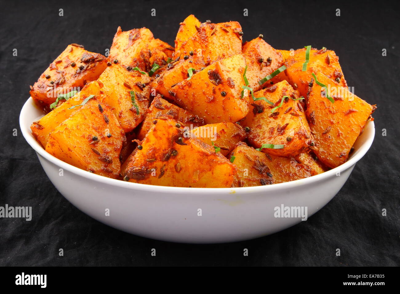 Jeera, Aloo - patate insaporite con il cumino è una calda e piccante per accompagnare curry può essere mangiato come uno spuntino con pane,paratha Foto Stock
