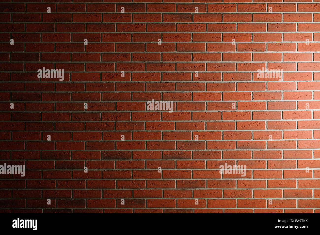 Muro di mattoni texture con luce laterale Foto Stock