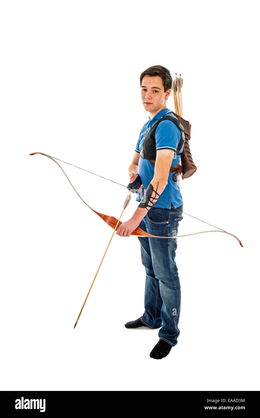 Ragazzo con la maglietta blu e jeans in piedi con un longbow Foto Stock