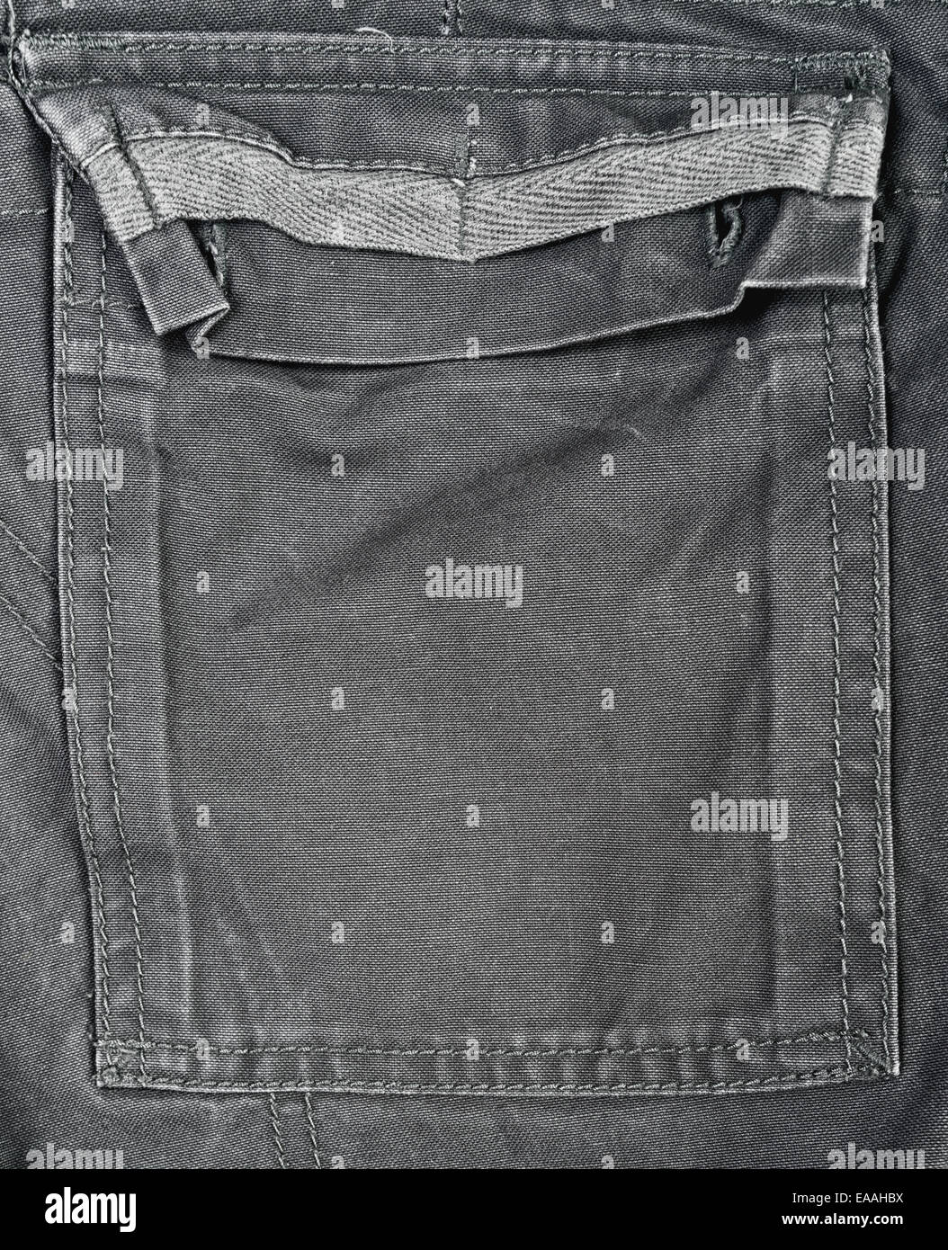 Vuoto pantaloni grigi tasca come copia di sfondo spazio Foto Stock