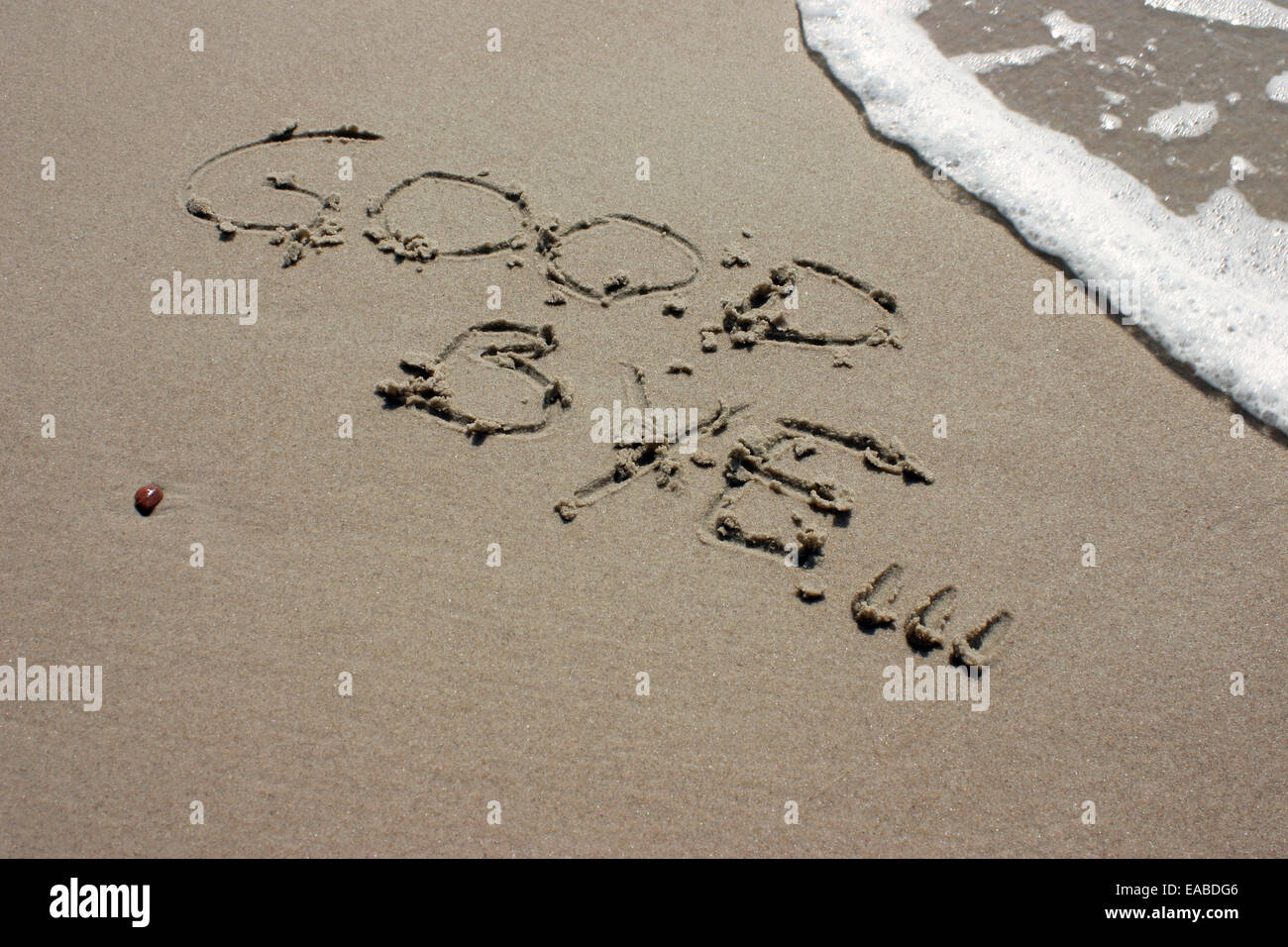 Parole Good bye scritto sulla spiaggia di sabbia Foto Stock