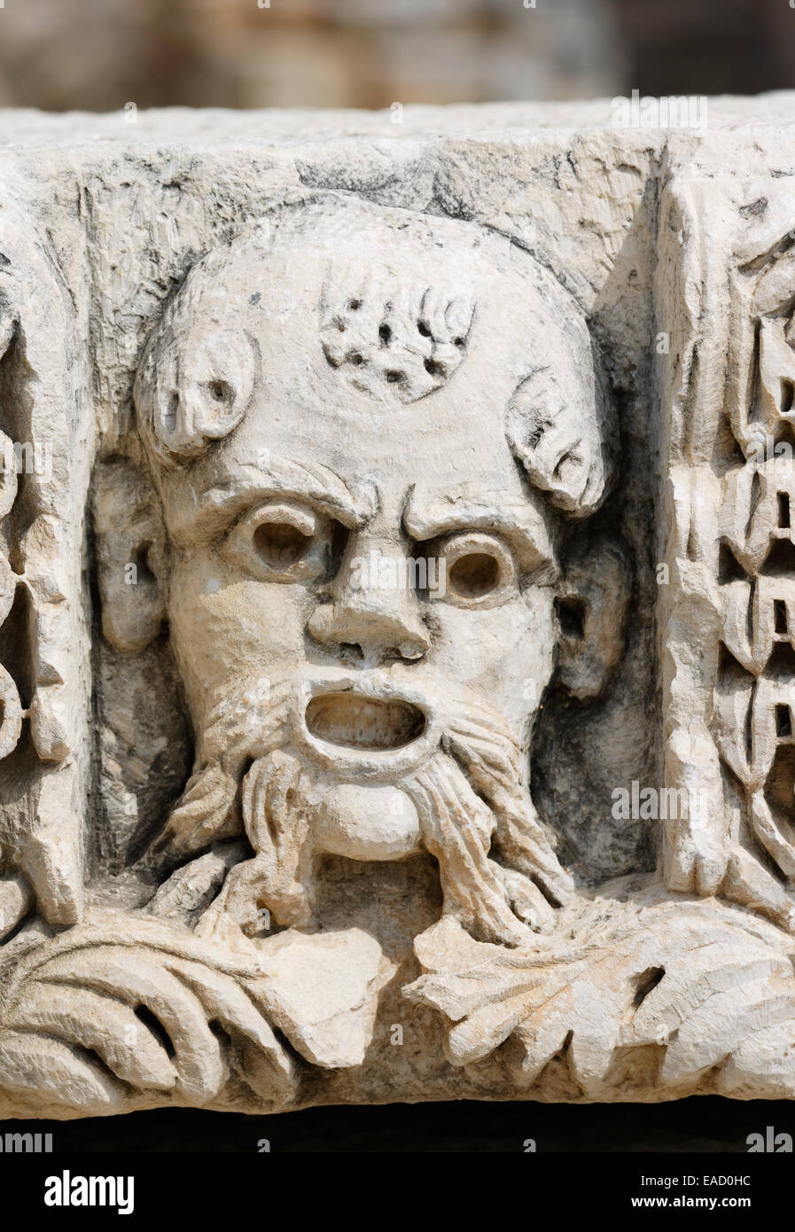 Bassorilievo in pietra, maschera, MYRA, Demre, Lycia, Provincia di Antalya, Turchia Foto Stock