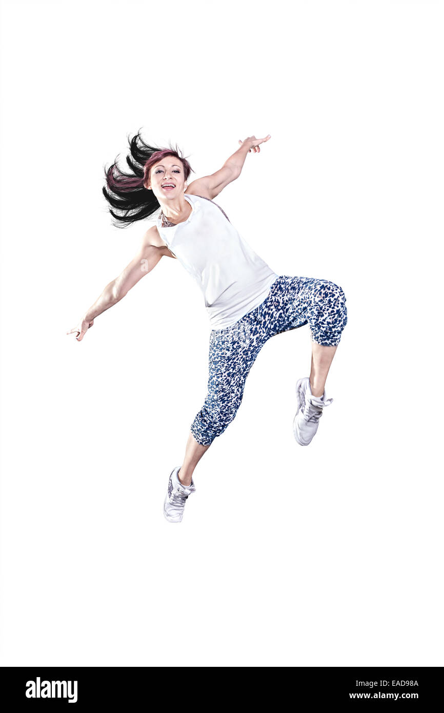Una donna in abiti sportivi a fitness esercizio di danza o aerobica Foto Stock