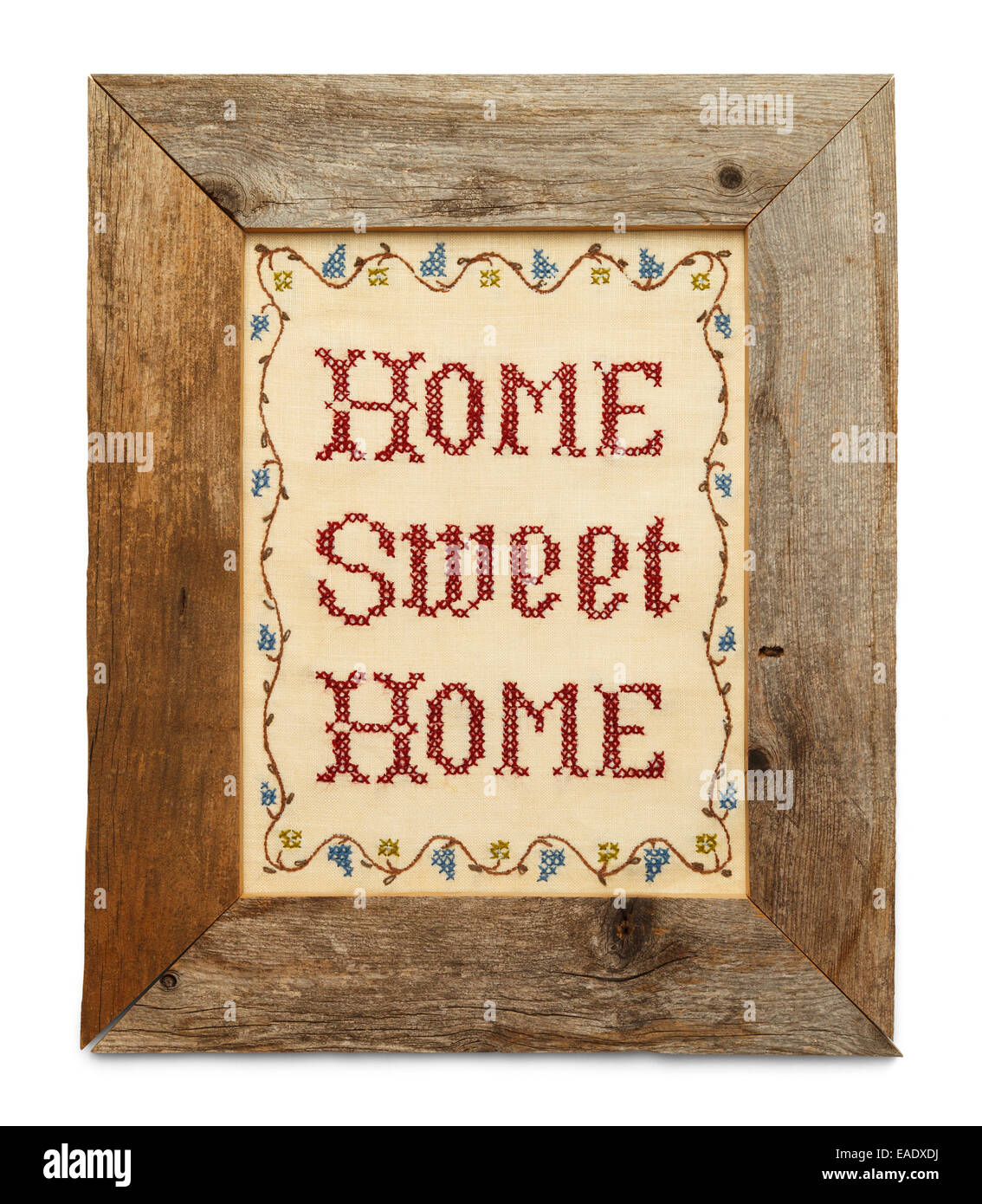 Home Sweet Home Punto Croce in legno rustico telaio isolato su sfondo bianco. Foto Stock