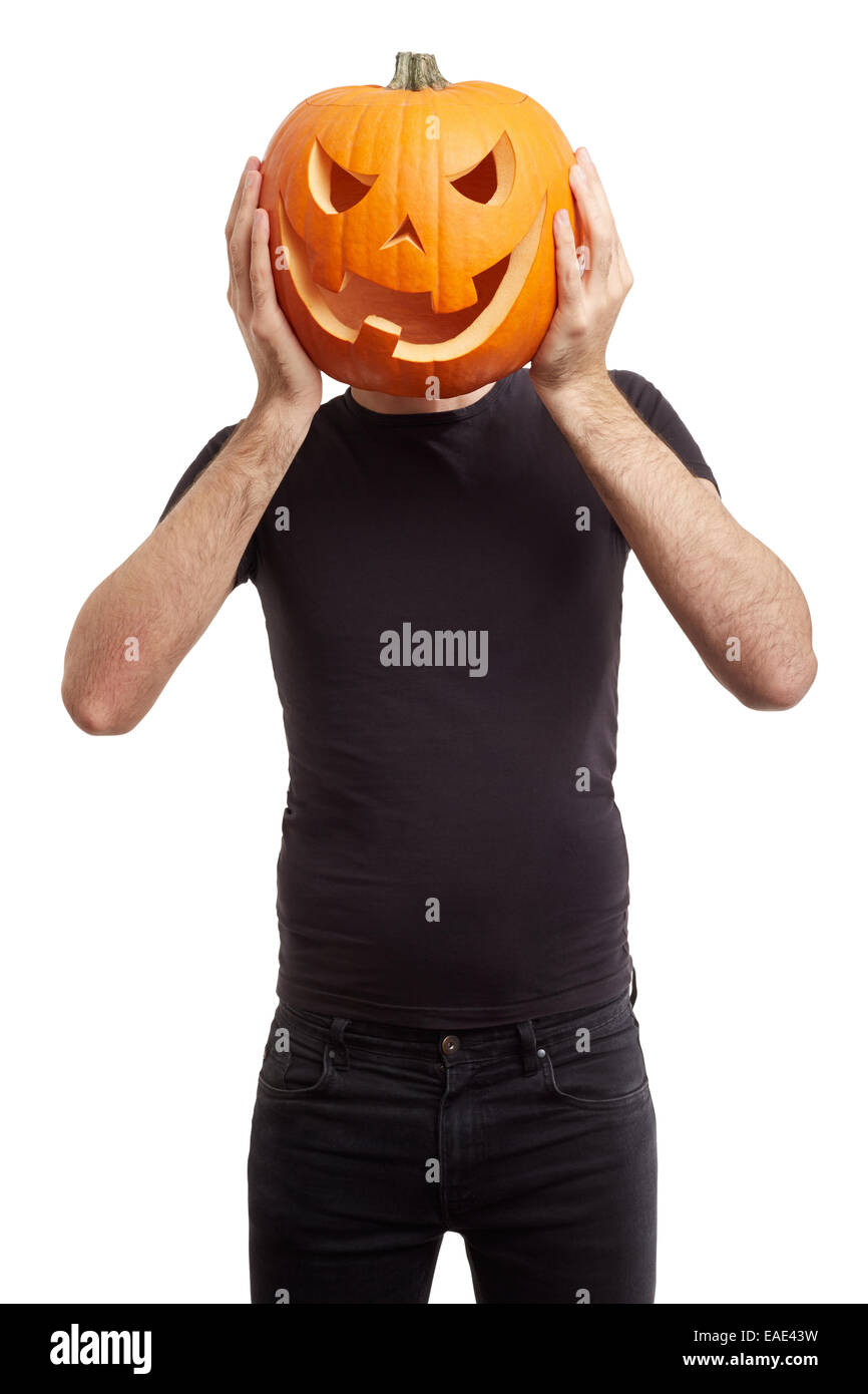 Zucca di Halloween sulla testa di uomo, scherzando Foto Stock