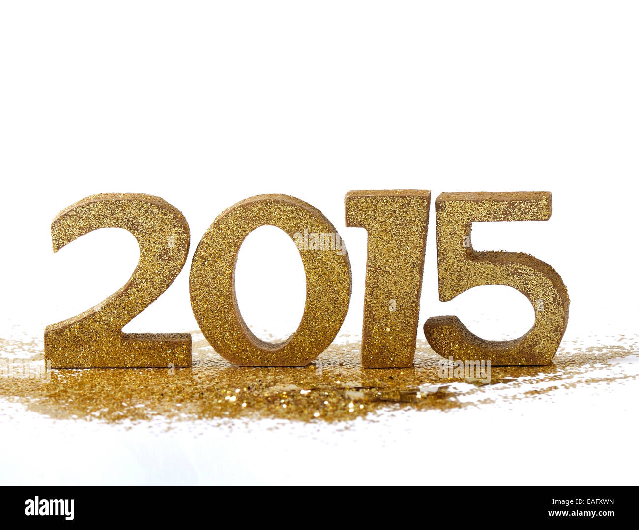 2015 Le Figure su oro glitter e sfondo bianco Foto Stock