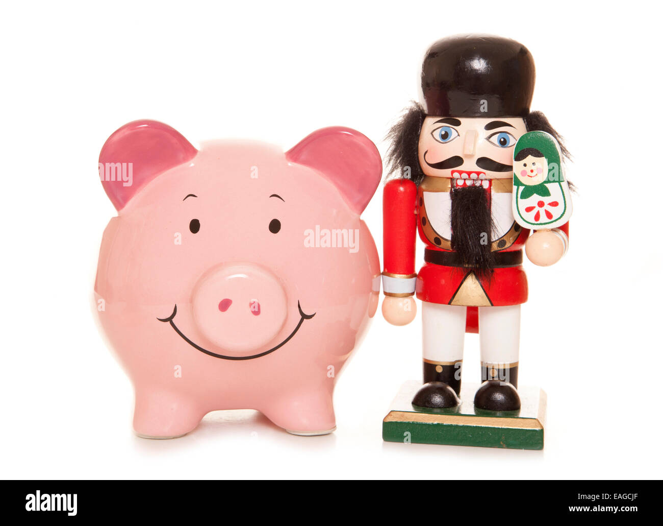 Salvadanaio e schiaccianoci ornamento di Natale intaglio Foto Stock