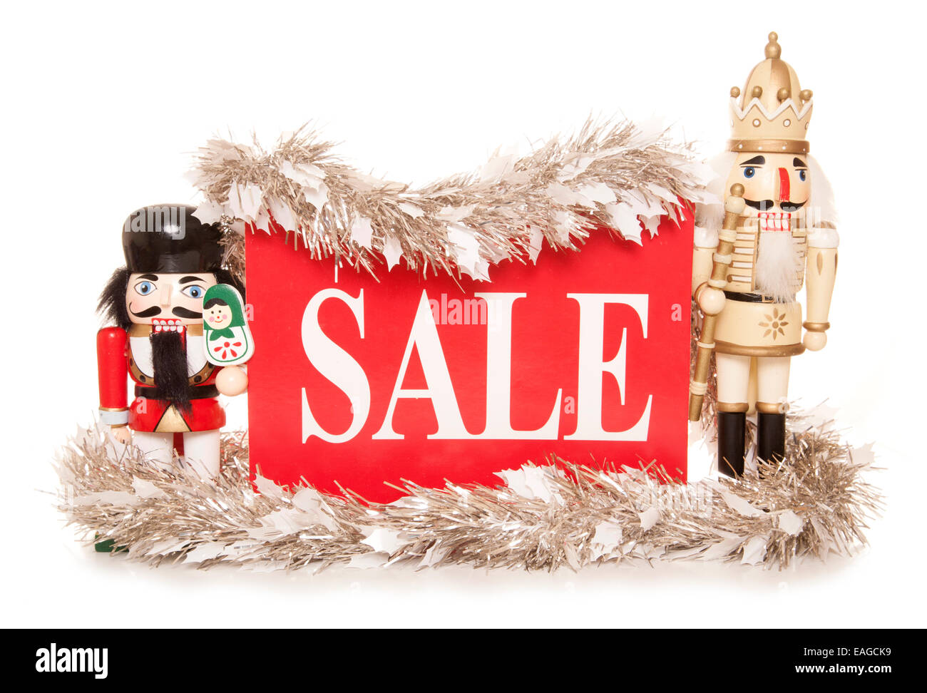 Vendita di natale segno con ornamenti schiaccianoci intaglio Foto Stock