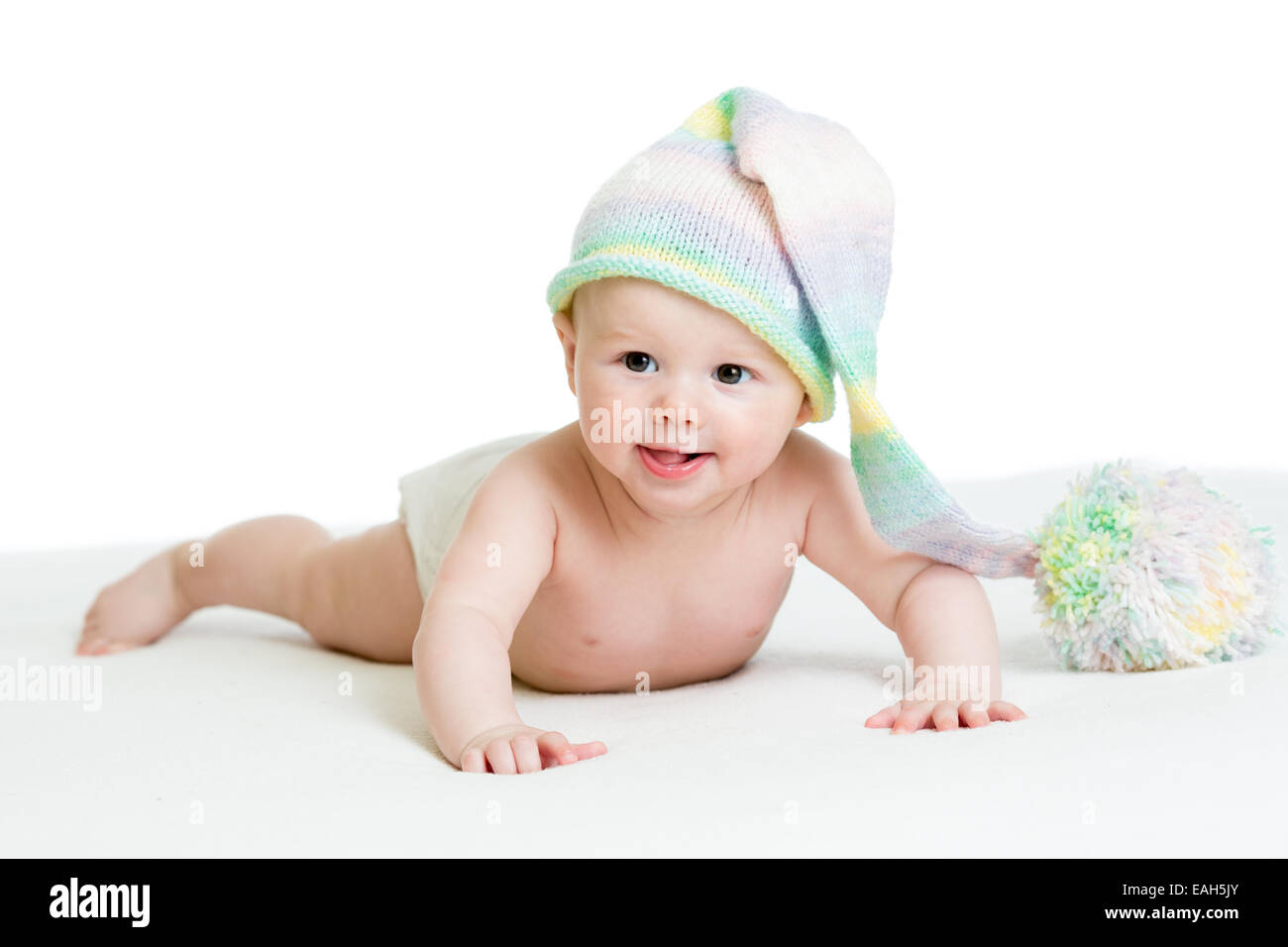 Sorridente bimbo neonato in funny hat Foto Stock