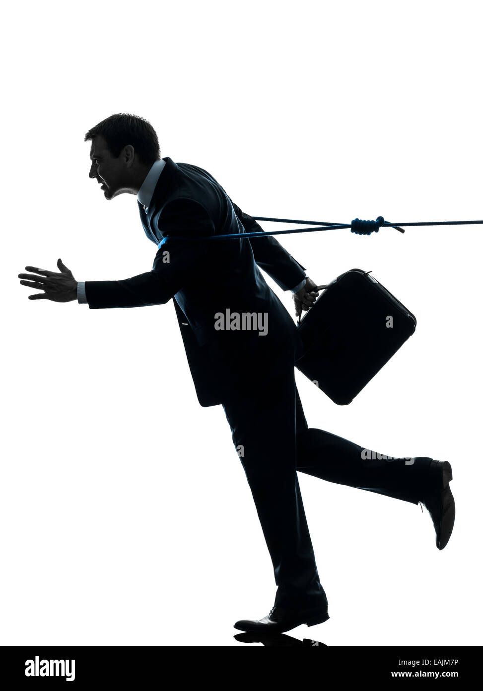 Un uomo d'affari catturato dal lasso di corda in silhouette studio isolato su sfondo bianco Foto Stock
