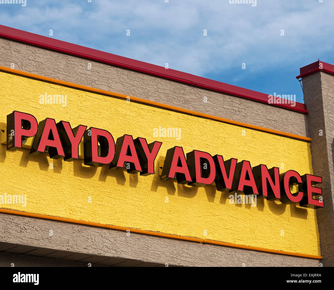 Un segno pubblicità Payday anticipo servizi finanziari Foto Stock