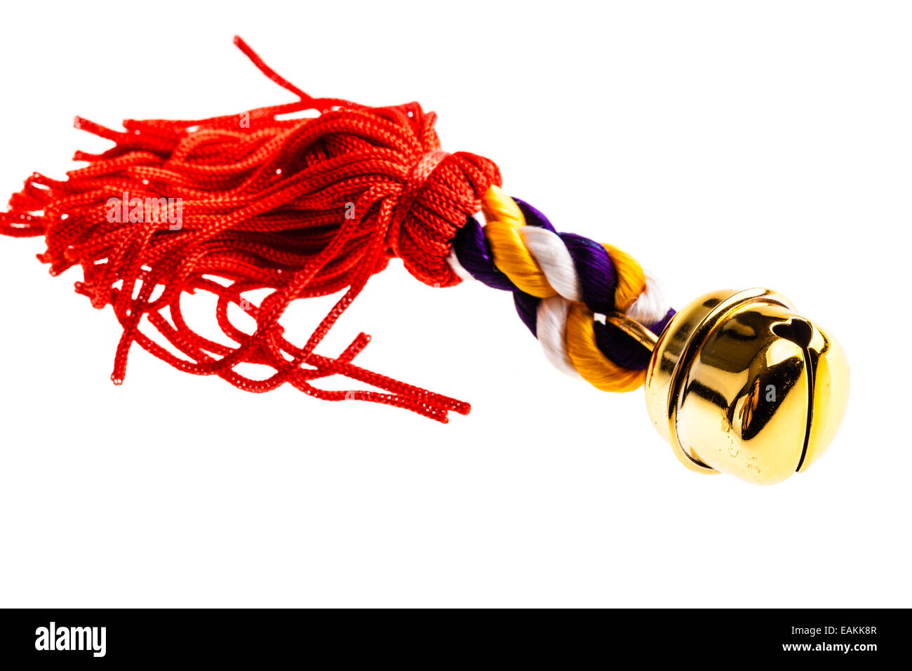 Un piccolo jingle bell isolate su un puro sfondo bianco Foto Stock