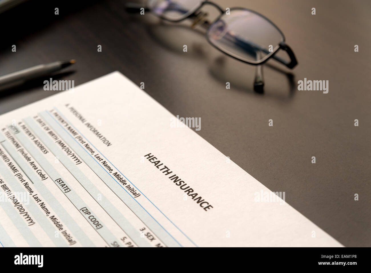 Il riempimento di assicurazione sanitaria modulo applicazione Foto Stock
