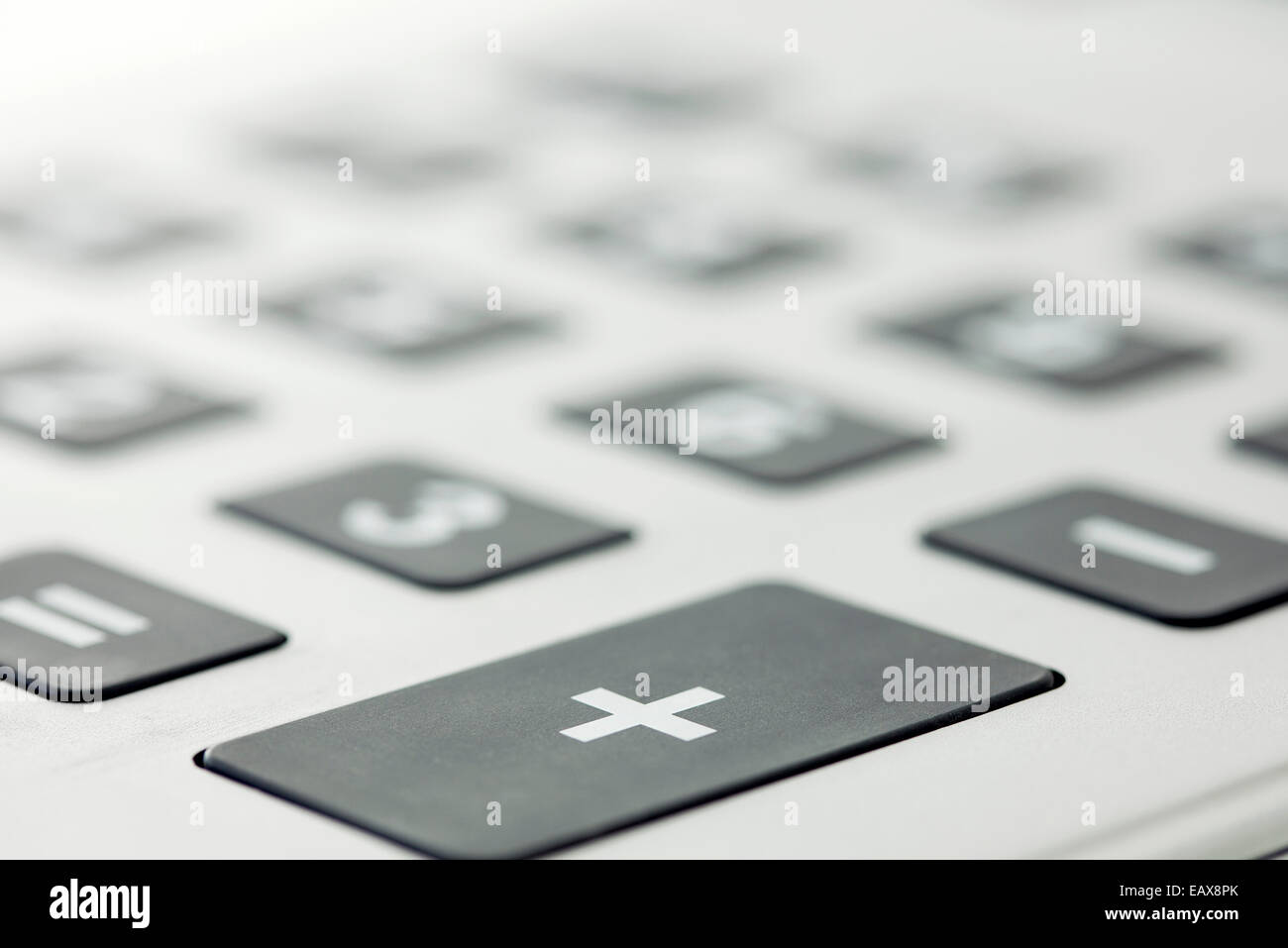 Close-up di aggiunta pulsante sulla calcolatrice Foto Stock