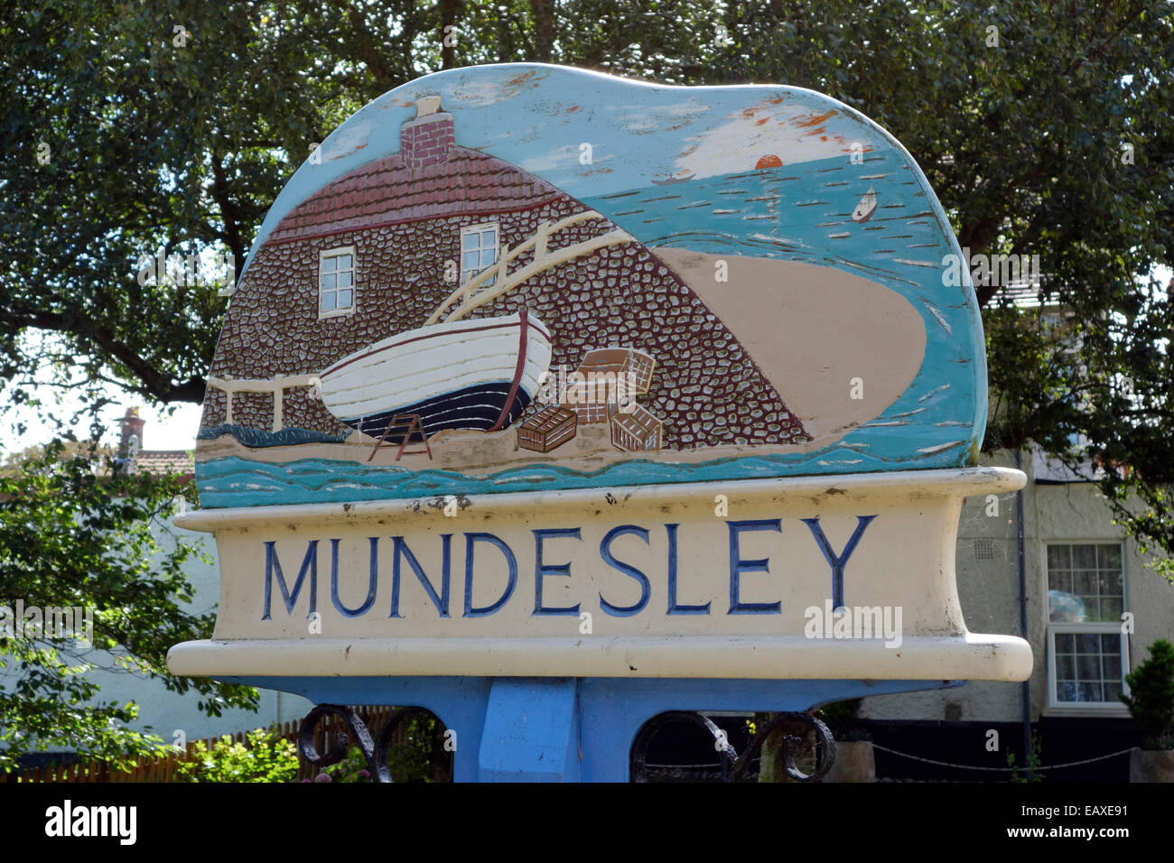 Villaggio segno a Mundesley, Costa North Norfolk Foto Stock