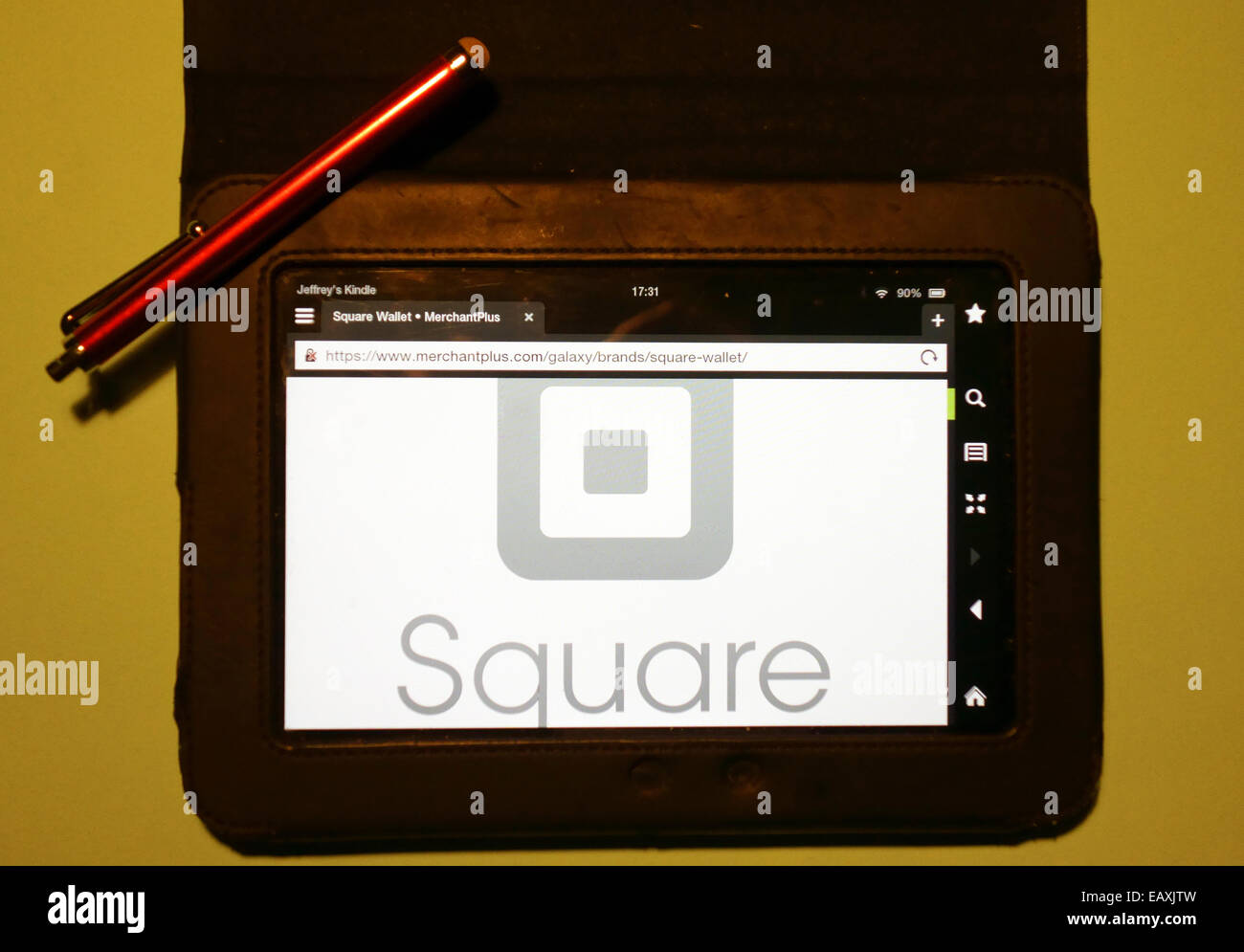 Pagamenti quadrati app Il logo mostrato sulla schermata di tablet con stilo, Londra fondata da Jack Dorsey e Jim McKelvey Foto Stock