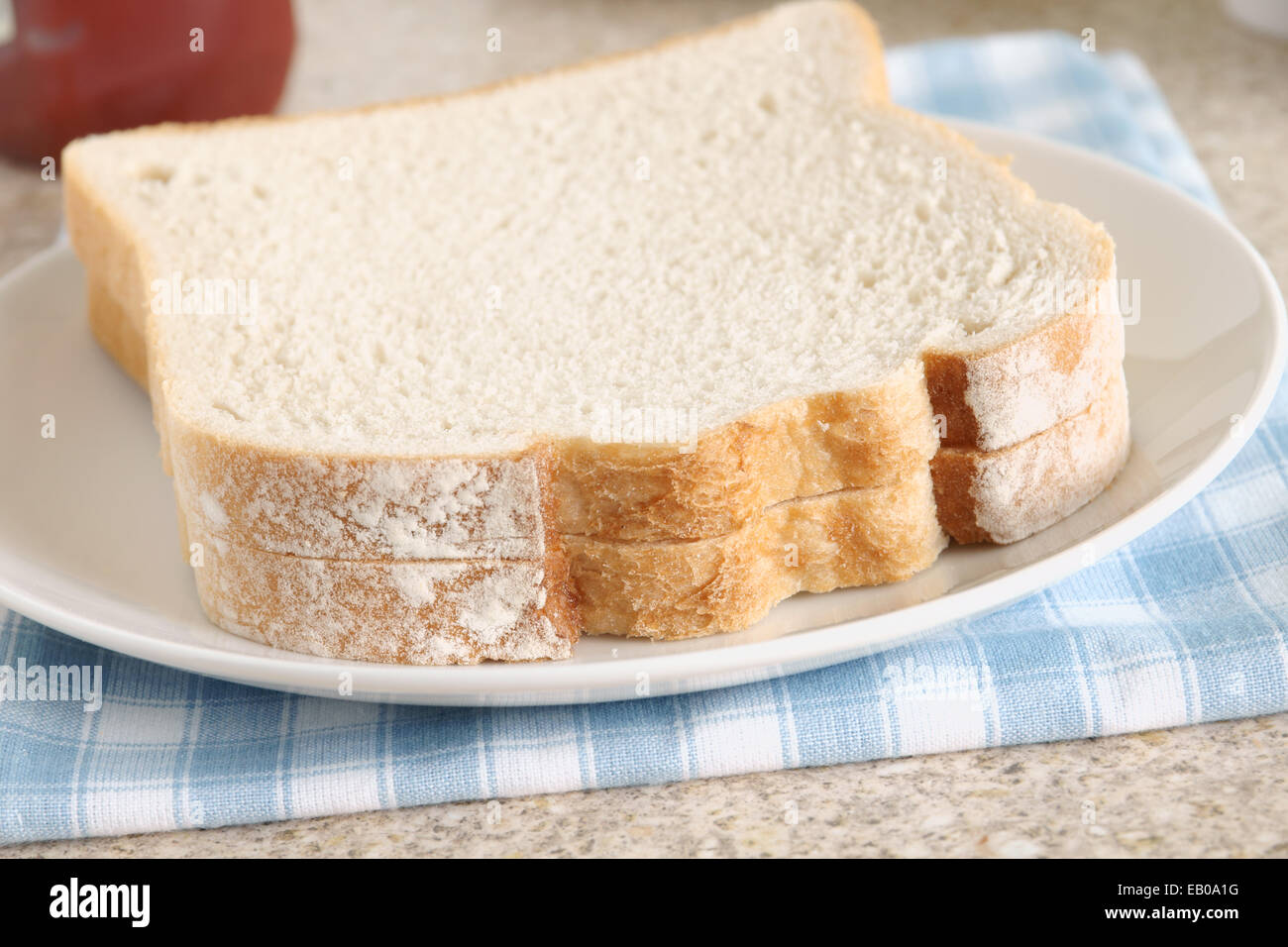 Plain fette di pane bianco con il burro n. Foto Stock