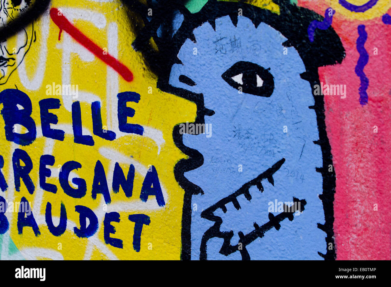 Muro di Berlino tag Cartoon blue Graffiti street art Foto Stock
