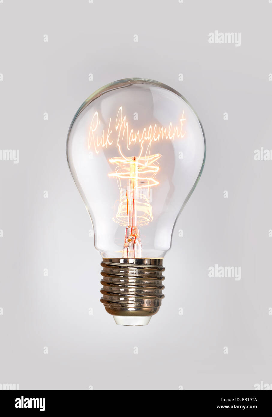 La gestione del rischio in un concetto di lampadine a filamento. Foto Stock