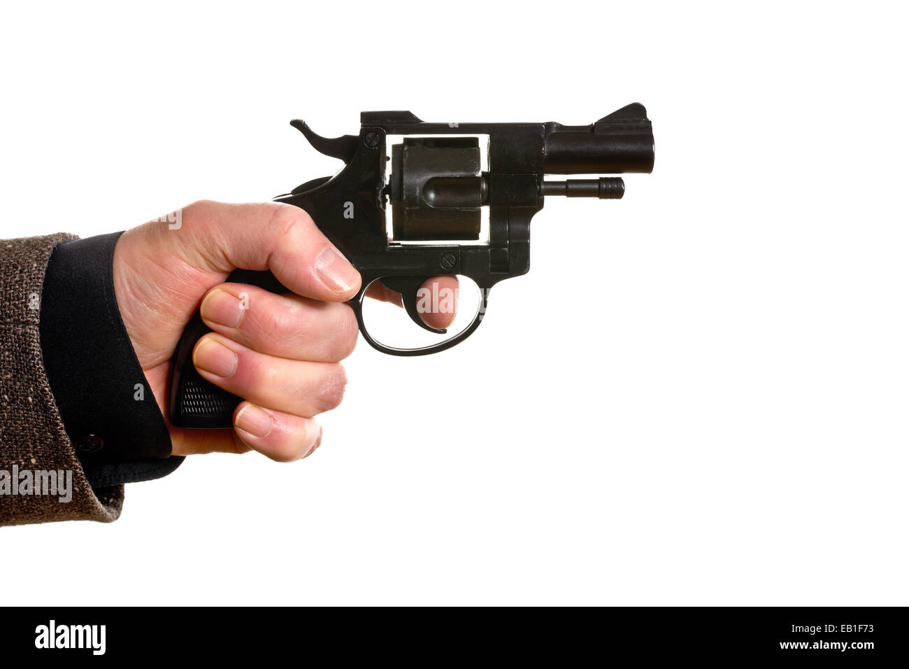 L'uomo le riprese di una pistola su sfondo bianco Foto Stock