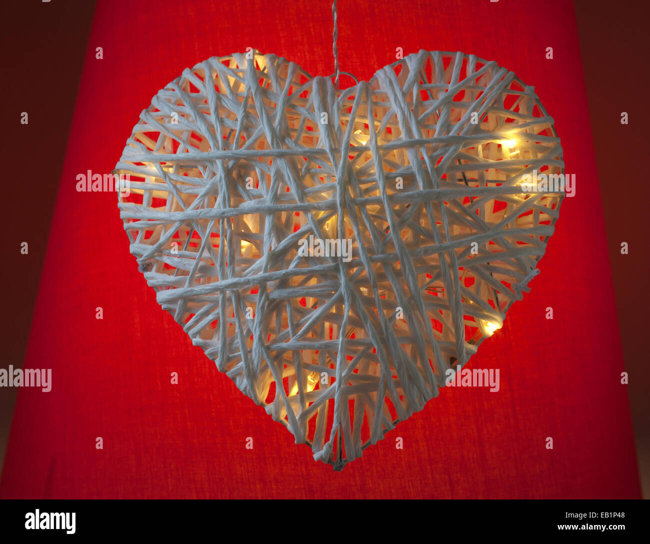 Ritratto di amore il cuore con la luce che brilla attraverso Foto Stock