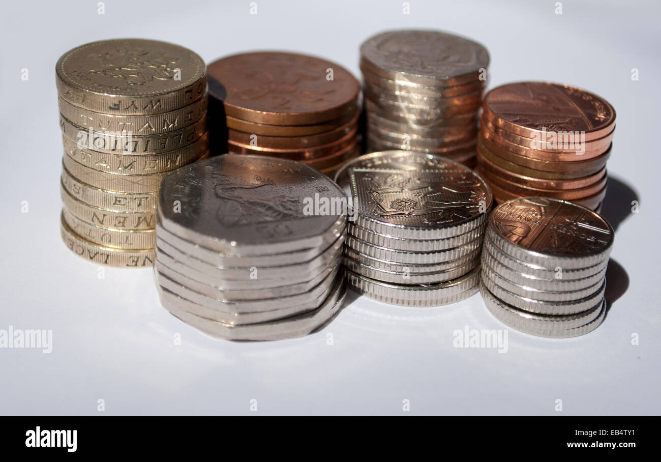 Pile di Sterling monete della Gran Bretagna Foto Stock
