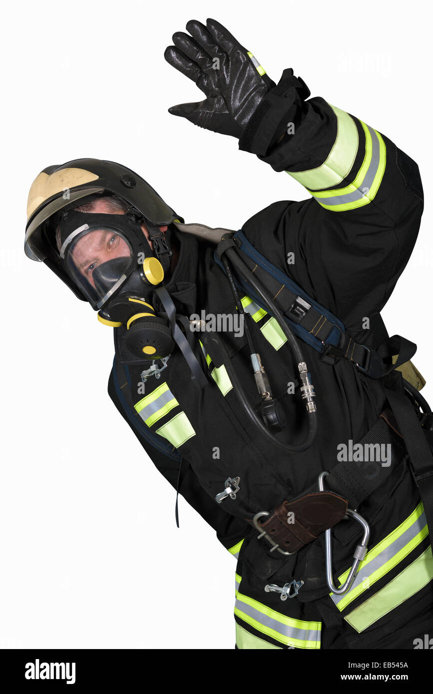 Vigile del fuoco in autorespiratori ad aria compressa a mano gesto mostra OK Foto Stock