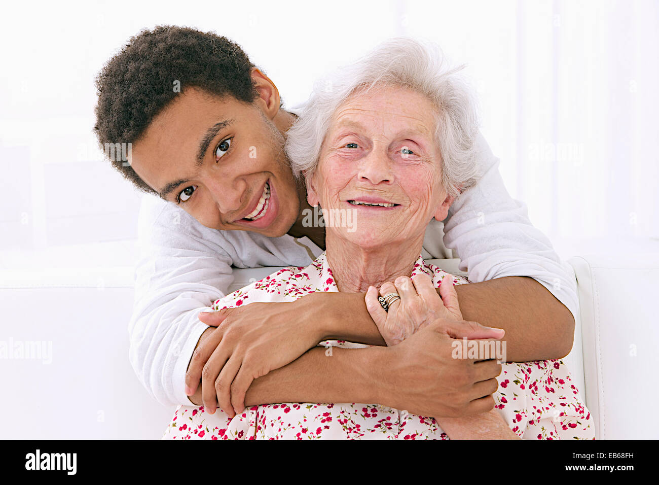Persona anziana & adolescente Foto Stock