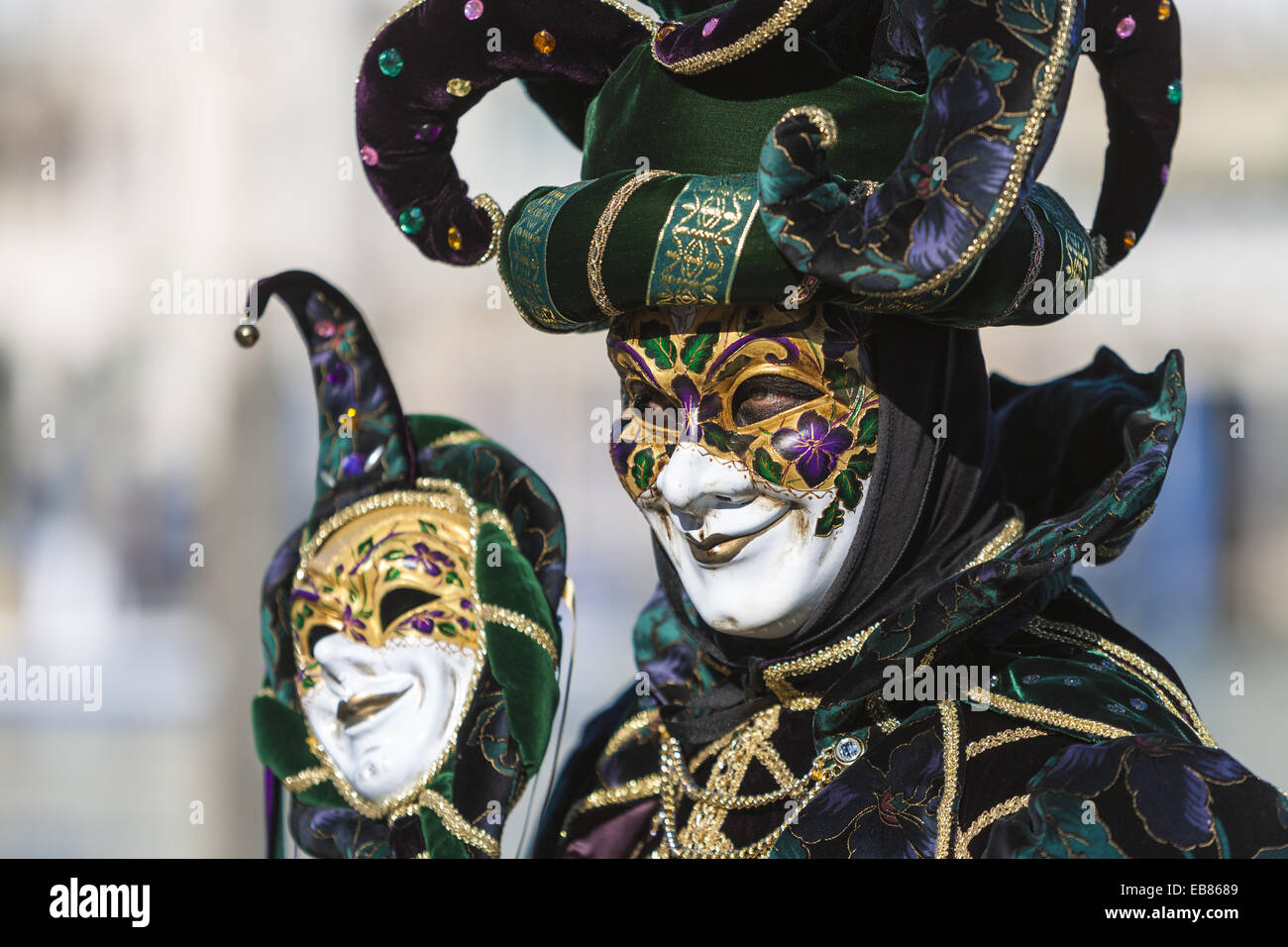 Una mascherata arlecchino al carnevale di Venezia, Italia e Europa Foto  stock - Alamy